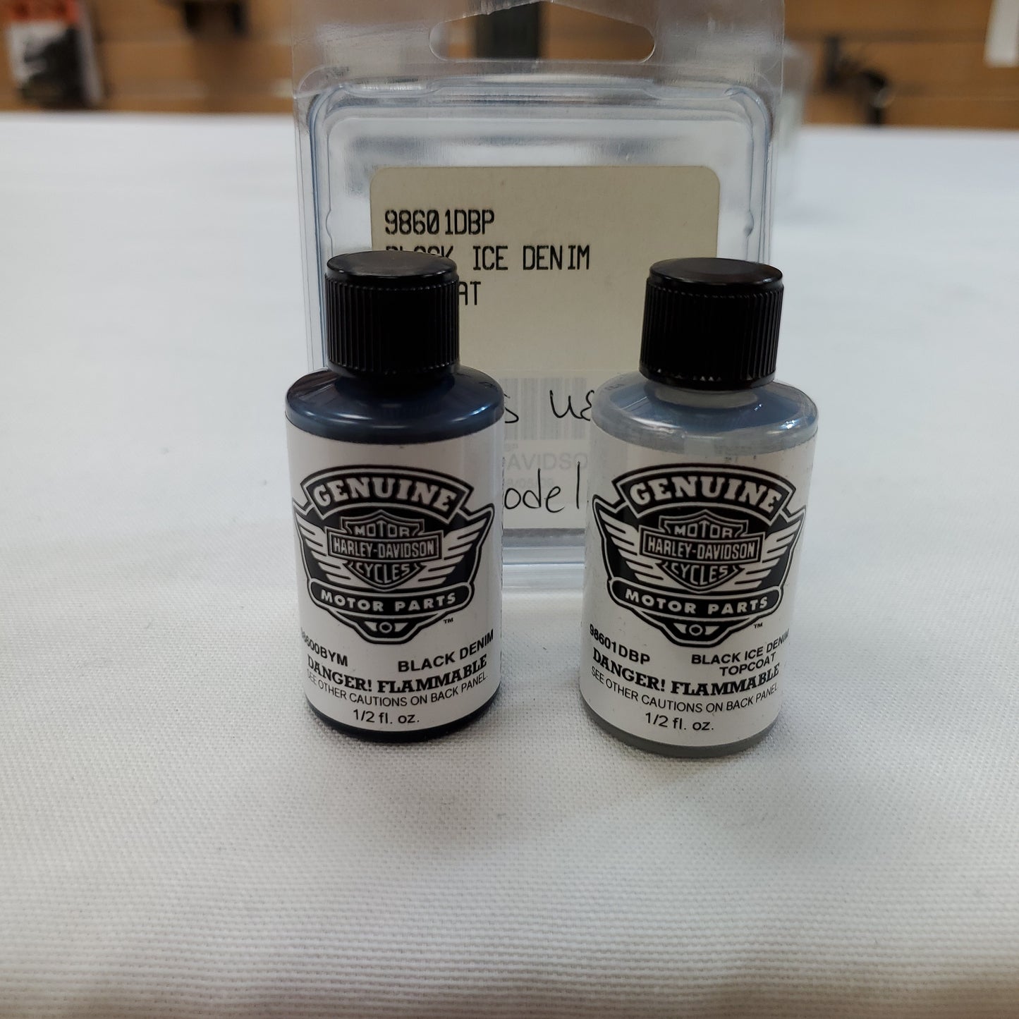 Genuine Harley-Davidson Touch up paint #98601DBP Kit includes Black Denim and Black Ice Denim TopCoat. 1/2 fl oz per bottle