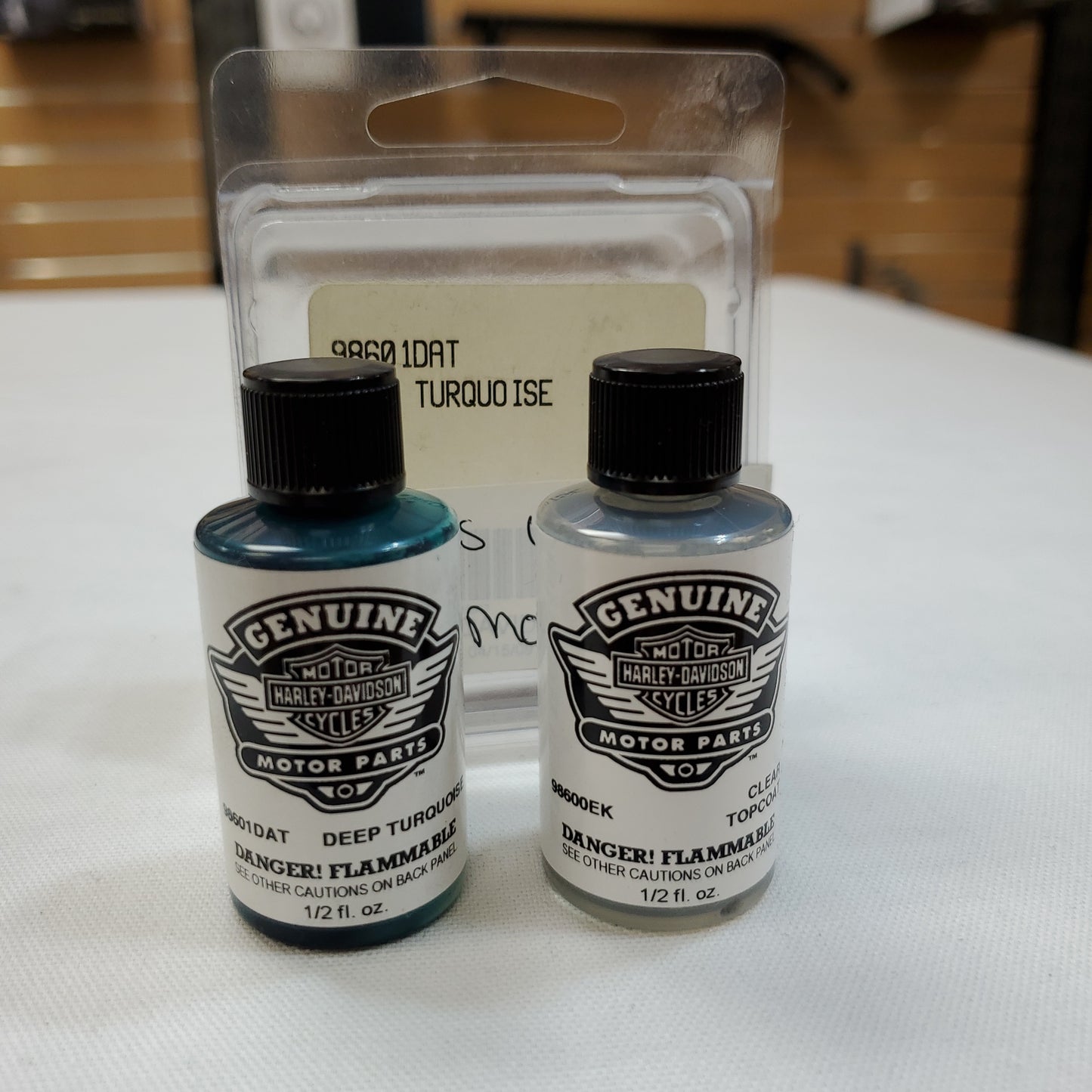 Genuine Harley-Davidson touch up paint #98601DAT Kit Includes Deep Turquoise color and clear topcoat Color is used for 2009 model year.
