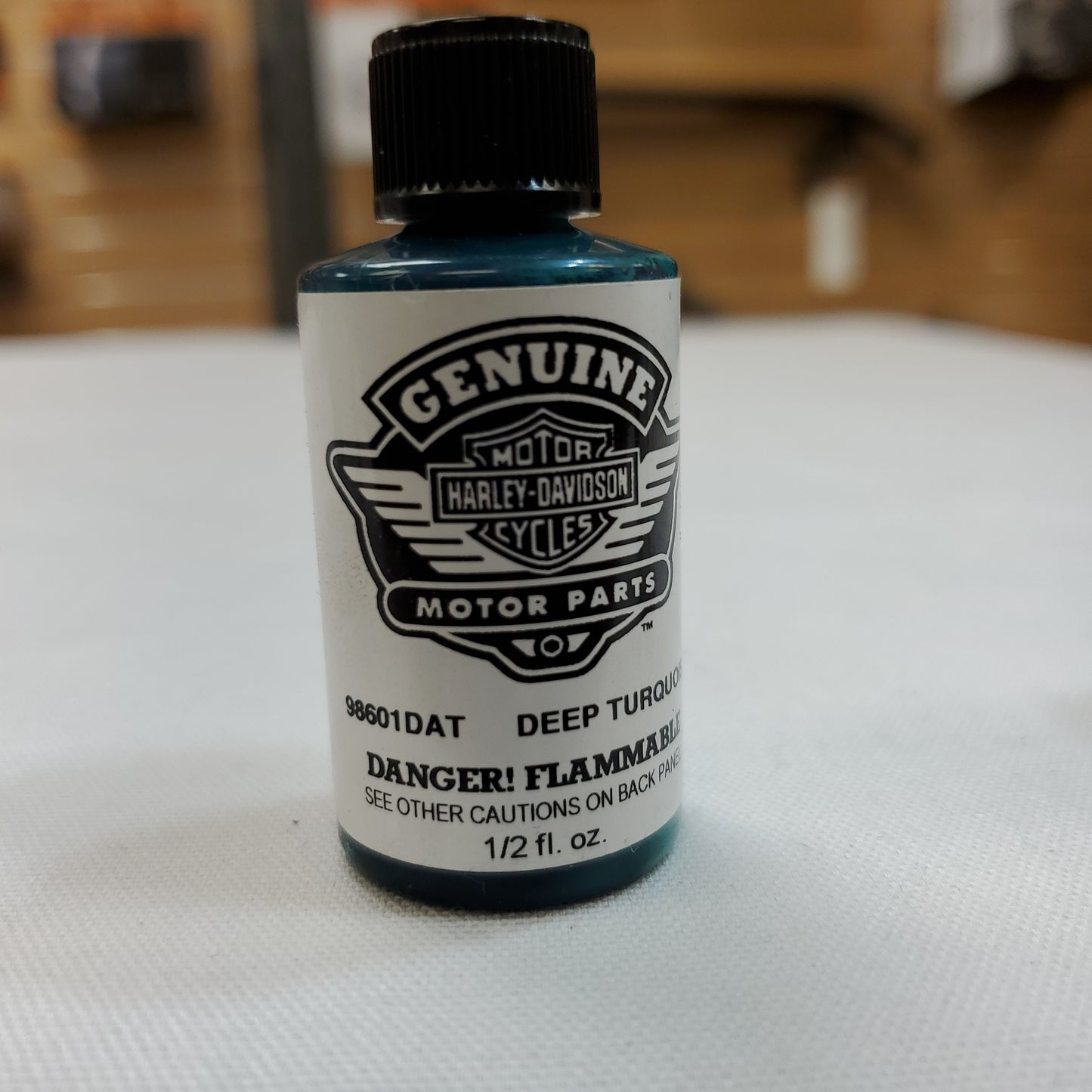 Genuine Harley-Davidson touch up paint #98601DAT Kit Includes Deep Turquoise color and clear topcoat Color is used for 2009 model year.