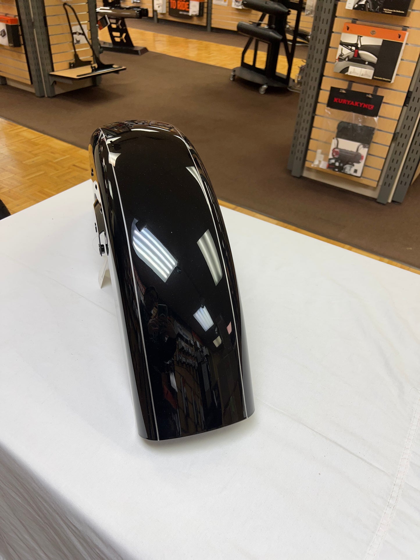 21" Vivid Black front fender with silver pinstripe. Painted to match smaller stock front fender, Stonewall Harley-Davidson